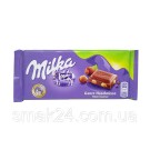 Шоколад молочный с целым фундуком Milka Ganze Hazelnuts  Швейцария 100г