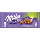 Шоколад молочный с целым фундуком Milka Ganze Hazelnuts  Швейцария 100г