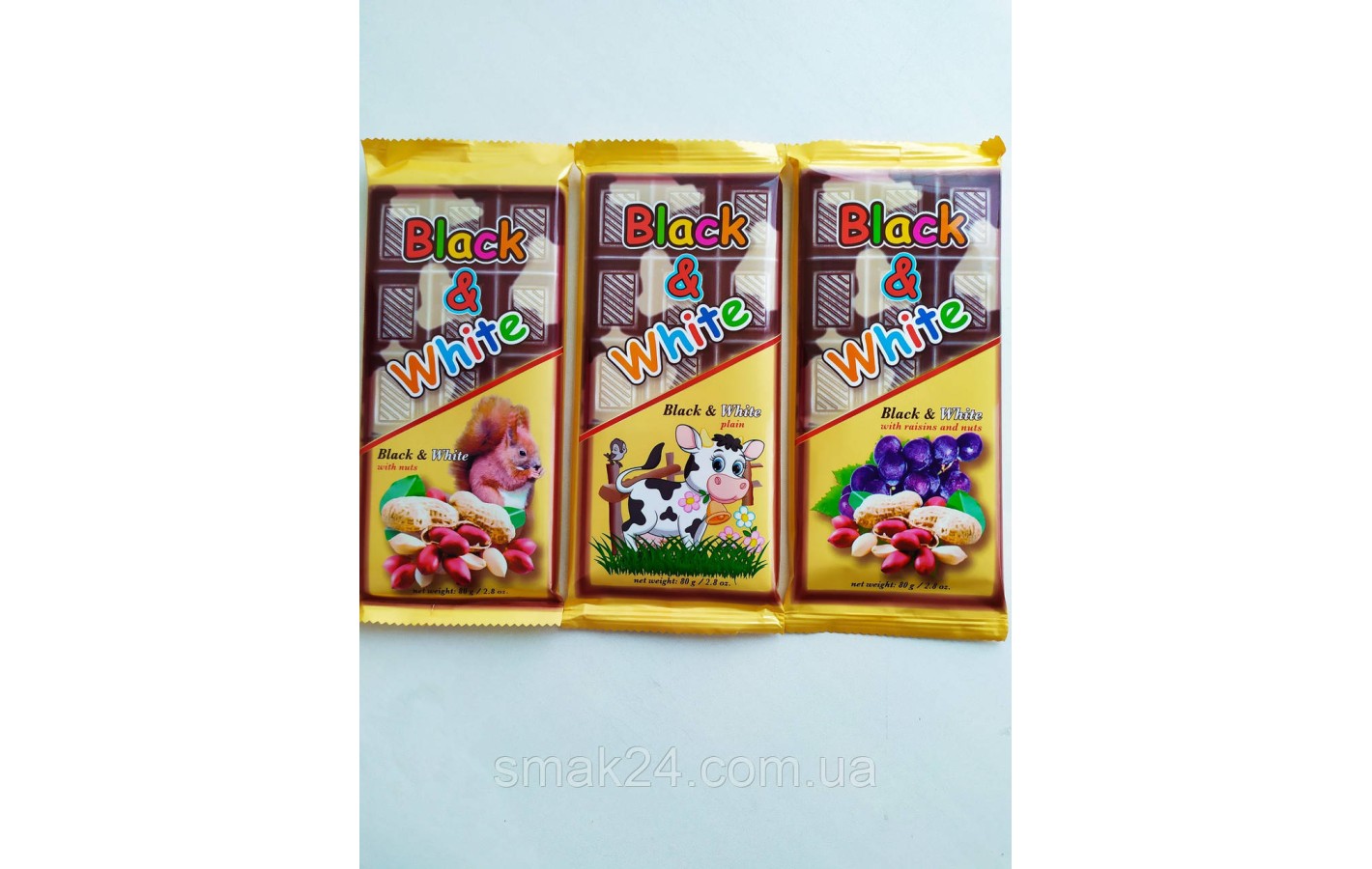 Шоколад (плитка) з арахісом і родзинками Black&White 80г Польща