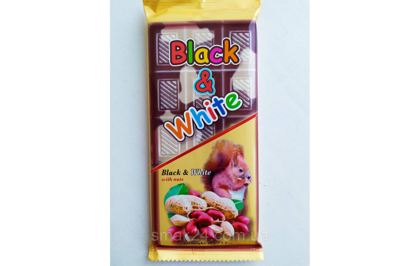 Шоколад (плитка) з арахісом і родзинками Black&White 80г Польща