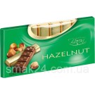 Шоколад молочний з лісовим горіхом Baron Hazelnut 100г Польща