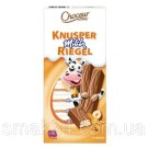 Шоколад молочний зі шматочками фундуку та пластівцями Chateau Knusper Milch Riegel 200г Німеччина