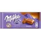 Шоколад молочный с ореховым кремом Milka Noisette Швейцария 100г
