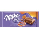 Шоколад молочный с карамелью и миндалем Milka Ganze Hazelnuts  Швейцария 100г
