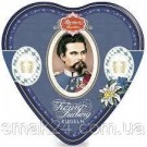Апельсиновий марципан у молочному шоколаді König Ludwig Kugel 3er Herzdose Reber Німеччина (3шт) 60г