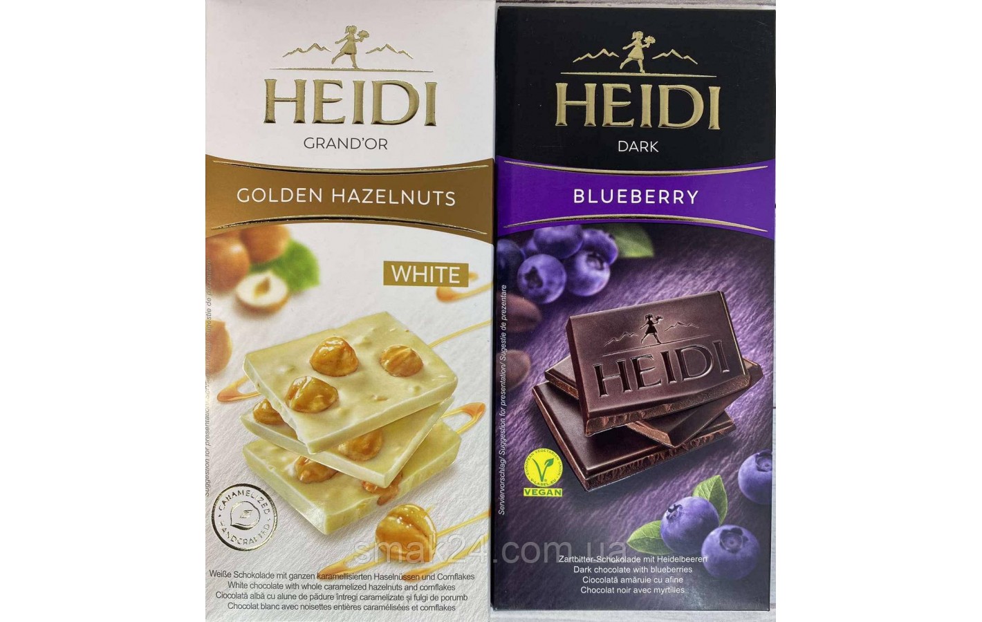 Шоколад (2шт) белый с цельным фундуком 100г и темный с Черникой 80г Heidi Румыния