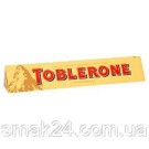 Швейцарський молочний шоколад Tobleron з медом і мигдальною нугою 35г