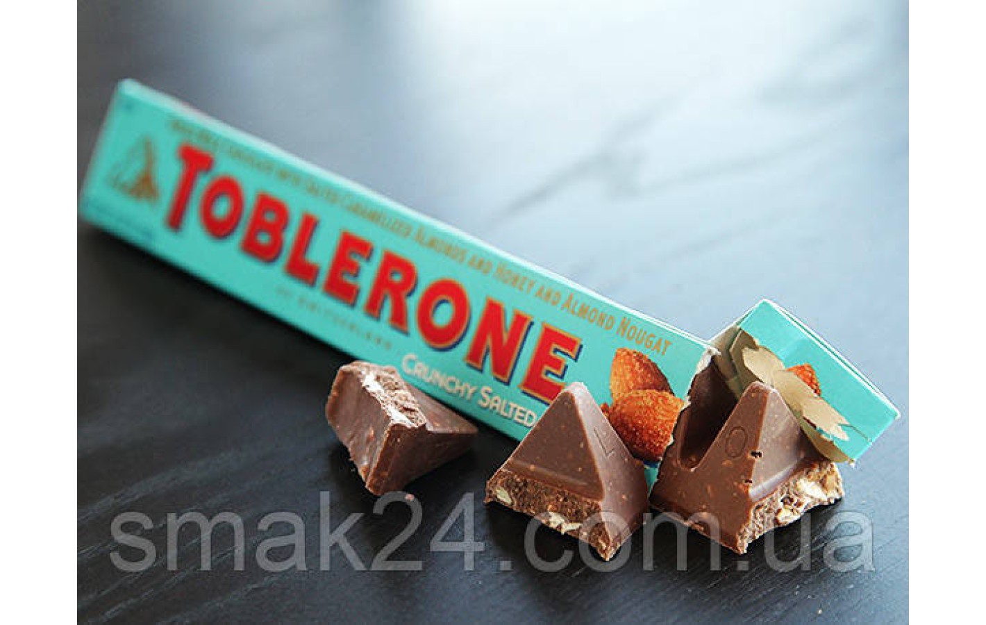 Швейцарський молочний шоколад Tobleron з медом, мигдалевою нугою і солоним карамельним мигдалем 100 г