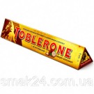 Швейцарський молочний шоколад Tobleron з медом, мигдальної нугою і кокосом 360 г