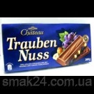 Шоколад молочний з цільним лісовим горіхом та родзинками Feinherb Nuss Chateau Німеччина 200г